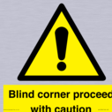 -blind-corner-proceed-with-caution-sign~
